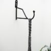 black-wall-hanger-wall-mounted-flower-hook-by-ib-laursen