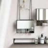 black-wall-hanging-storage-cabinet-with-5-rooms-mirror-door-by-ib-laursen