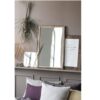 large-wall-hanging-mirror-with-bamboo-edge-by-ib-laursen